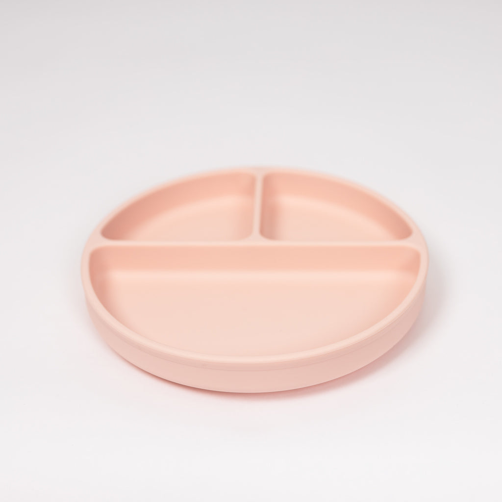 Silicone plate in blush pink on white background.