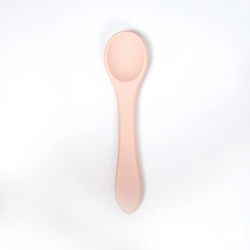 image of blush pink 100% food grade silicone toddler sized spoon