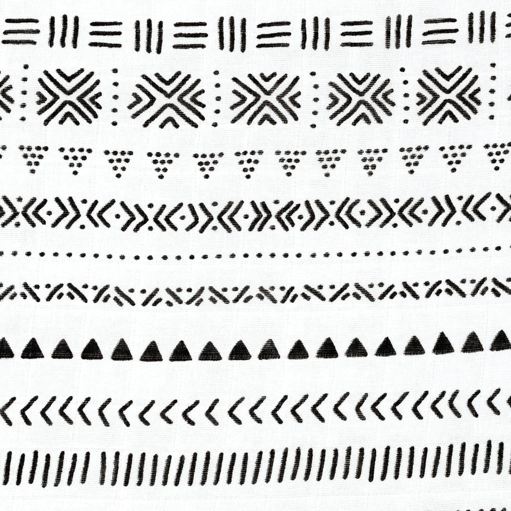 close up image of black and white tribal muslin crib sheet
