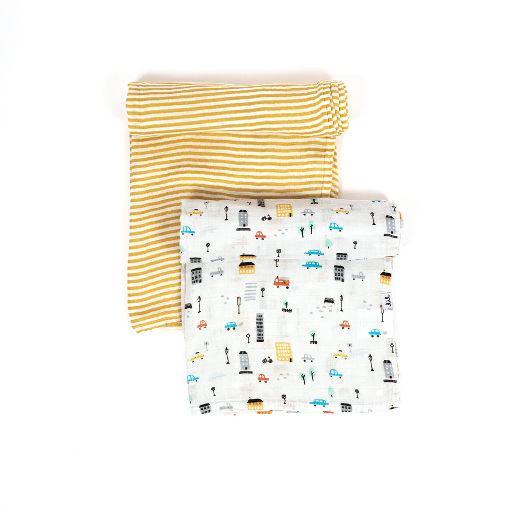 Premium bamboo cotton muslin swaddle blanket set of two includes city car print and ochre and white stripe print