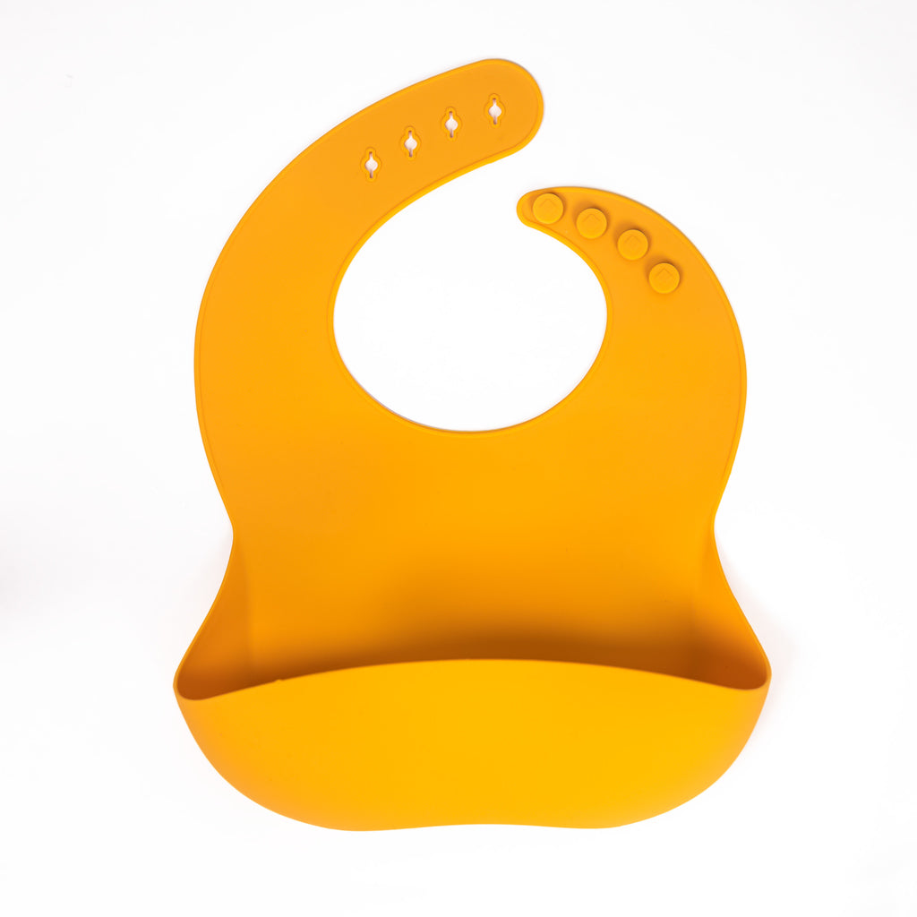 safety tested silicone bib in mustard yellow shipping from canada