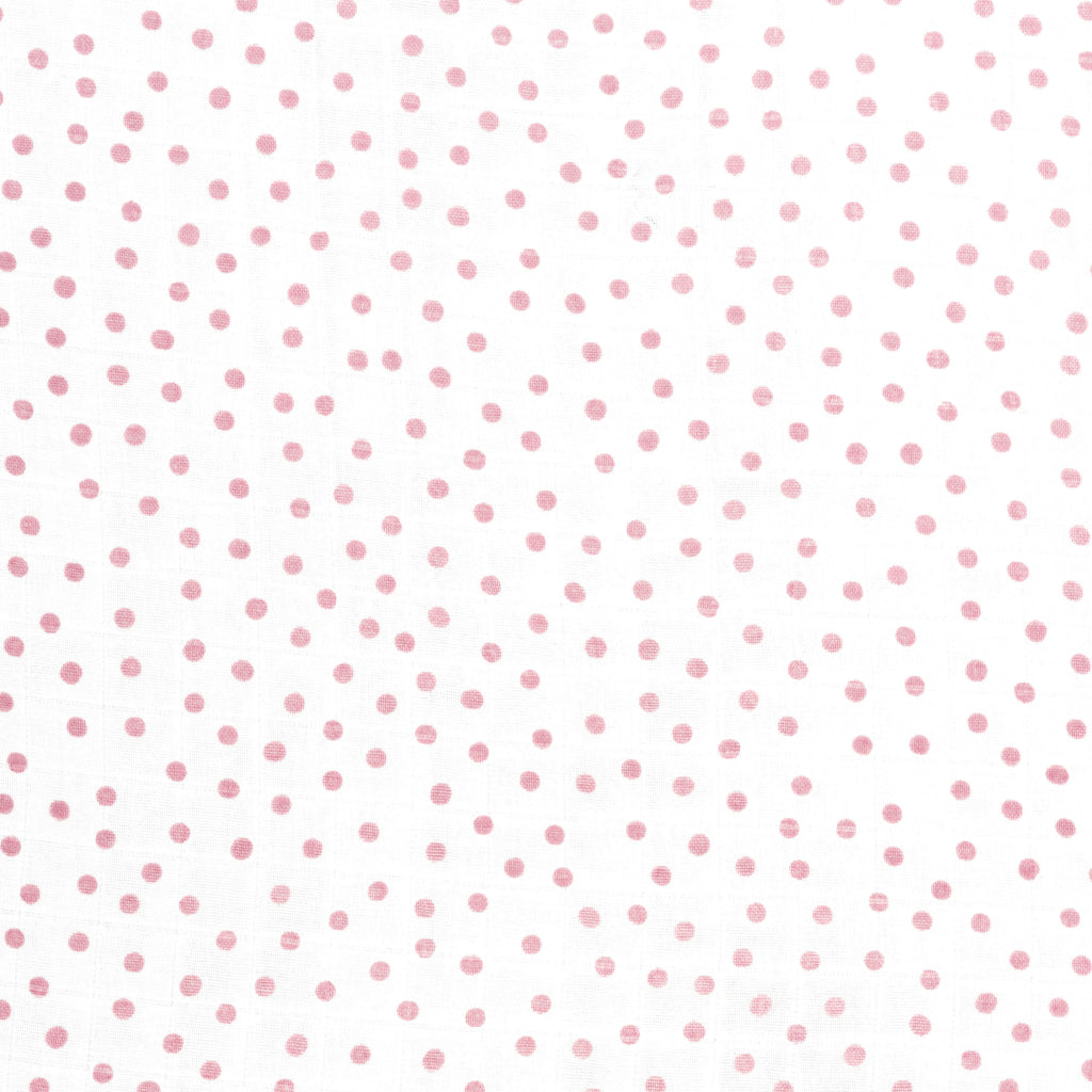 close up of blush dot print on premium bamboo cotton muslin