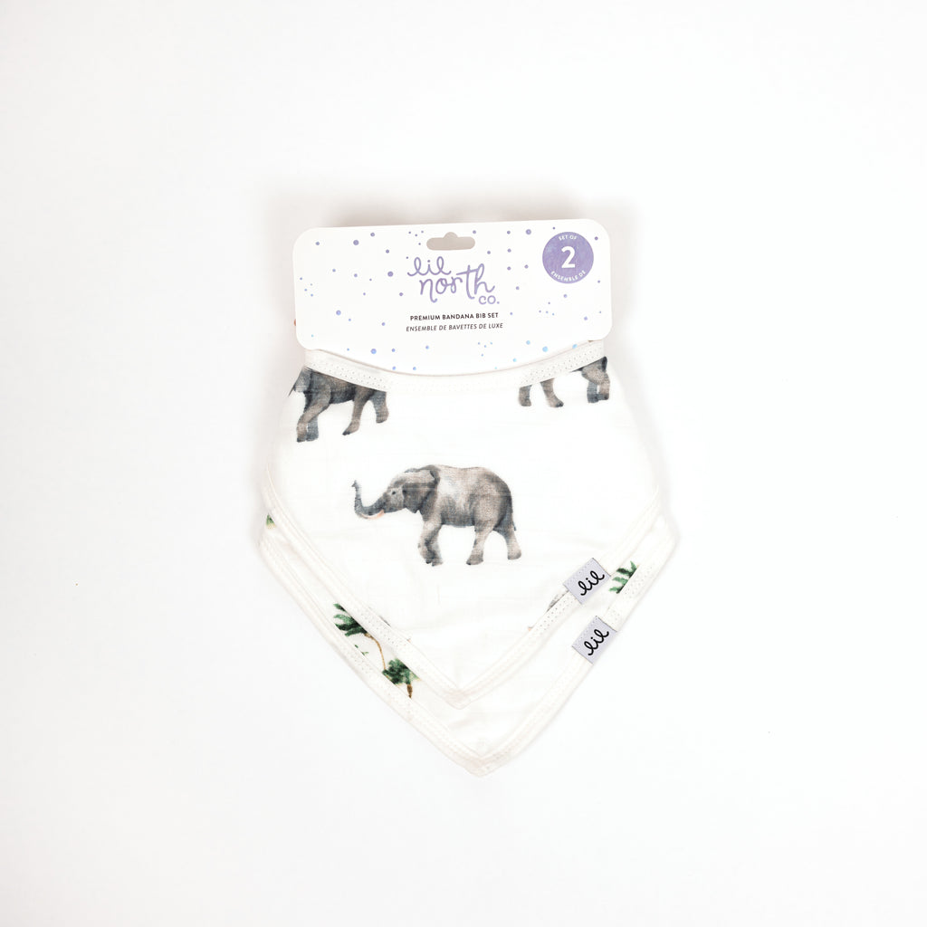 Perfectly packaged set of two bandana bibs including grey watercolour elephant and green and brown palm trees, perfect for a gender neutral baby gift