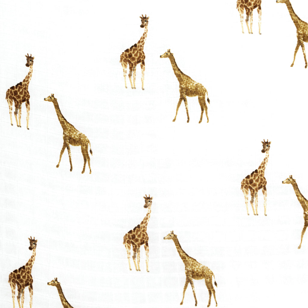 close up image of giraffe muslin crib sheet